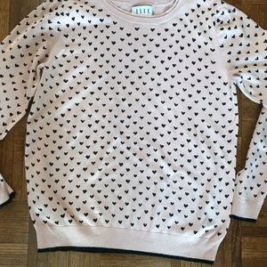 Pink sweater with black hearts, size L